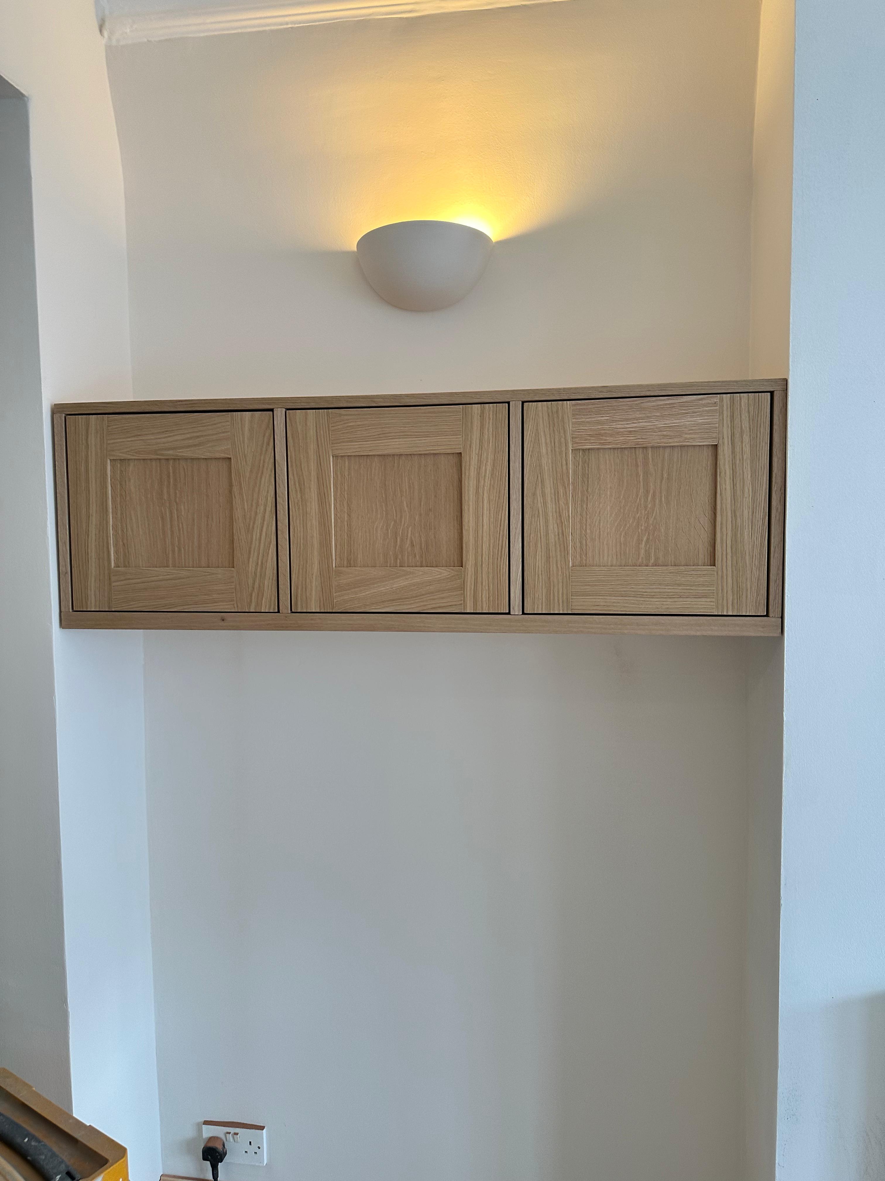 Luxury fitted furniture installation with premium materials