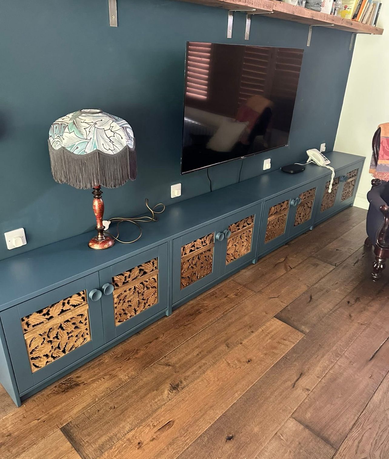 Custom black sliding barn doors with frosted glass panels and modern hardware